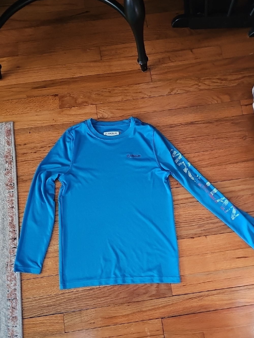 Magellan Youth Long Sleeve Bright Blue Performance Tee.